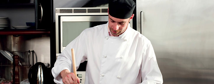 Chef preparing food in restaurant