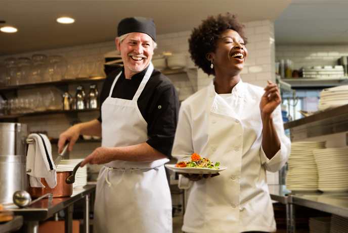 Image of kitchen staff wearing uniforms